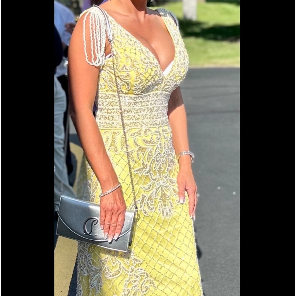 Yellow and white beaded long dress with matching hat